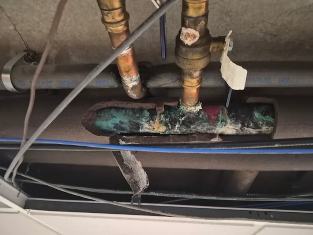 Corroded copper and brass fittings cut out and replaced